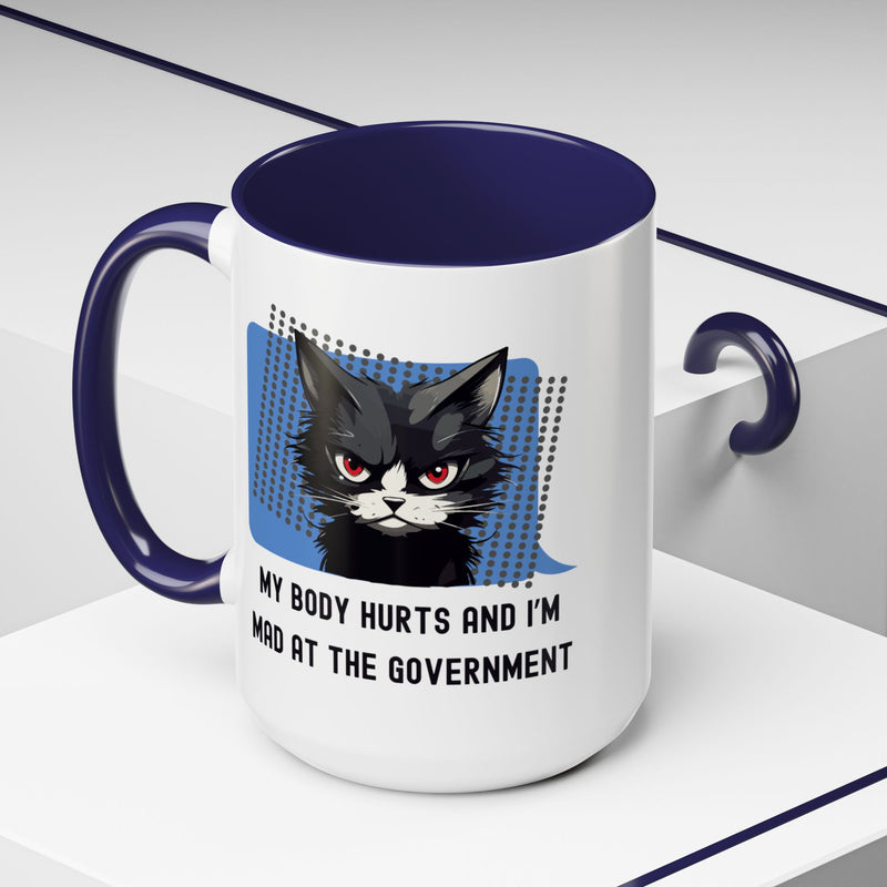 Coffee and Tea Mug — "My Body Hurts and I'm Mad at the Government" Sassy Cat Accent Mug