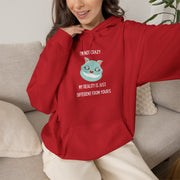 Graphic Hoodie — "I’m Not Crazy, My Reality Is Just Different From Yours" Wonderland Hooded Sweatshirt