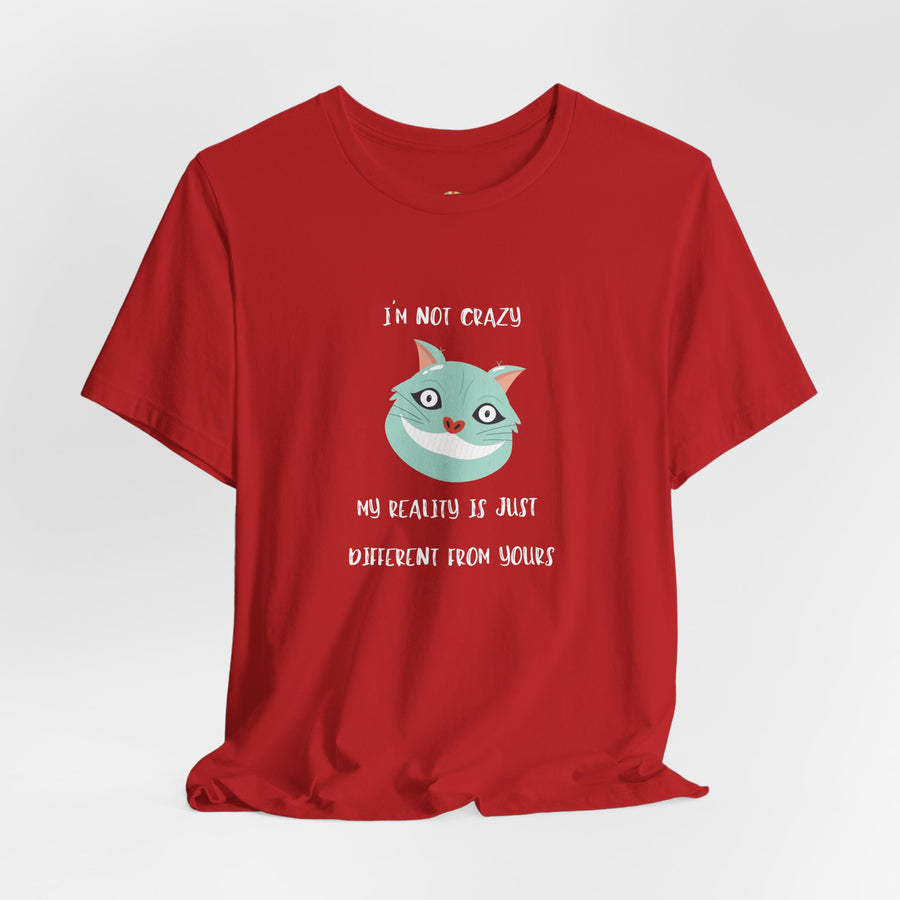 Graphic Tee — “I’m Not Crazy, My Reality Is Just Different From Yours” Wonderland T‑Shirt