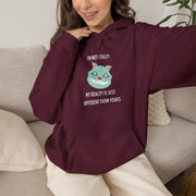 Graphic Hoodie — "I’m Not Crazy, My Reality Is Just Different From Yours" Wonderland Hooded Sweatshirt