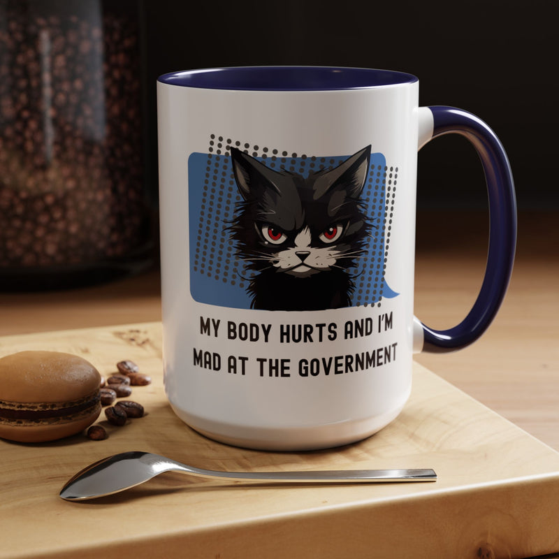 Coffee and Tea Mug — "My Body Hurts and I'm Mad at the Government" Sassy Cat Accent Mug