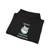 Graphic Hoodie — "I’m Not Crazy, My Reality Is Just Different From Yours" Wonderland Hooded Sweatshirt