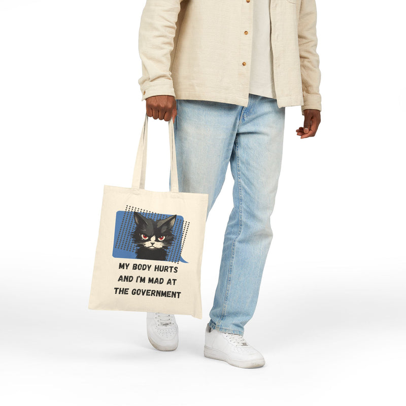 Graphic Reusable Tote Bag — "My Body Hurts and I’m Mad at the Government" Sassy Cat Canvas Tote