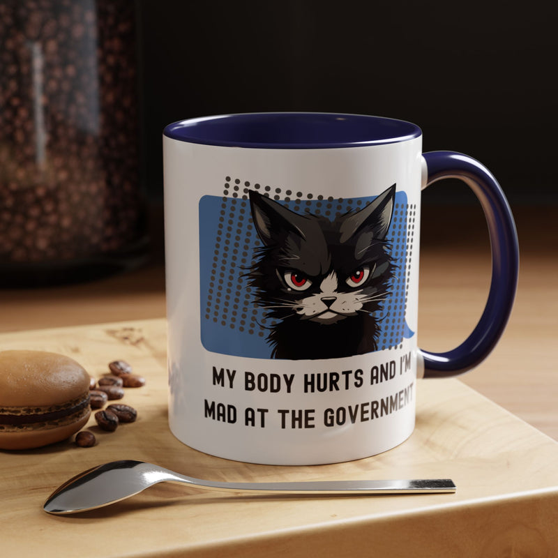 Coffee and Tea Mug — "My Body Hurts and I'm Mad at the Government" Sassy Cat Accent Mug