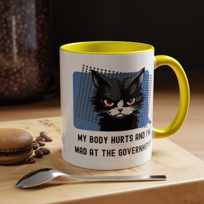 11 oz Coffee and Tea Mug — "My Body Hurts and I'm Mad at the Government" Sassy Cat Accent Mug