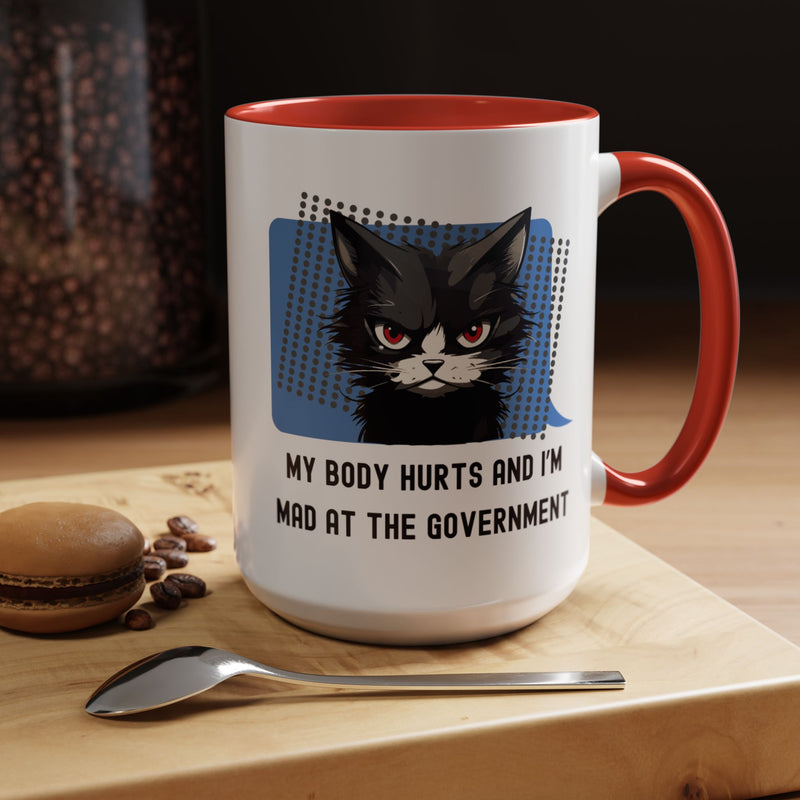Coffee and Tea Mug — "My Body Hurts and I'm Mad at the Government" Sassy Cat Accent Mug