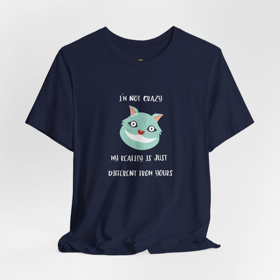 Graphic Tee — “I’m Not Crazy, My Reality Is Just Different From Yours” Wonderland T‑Shirt
