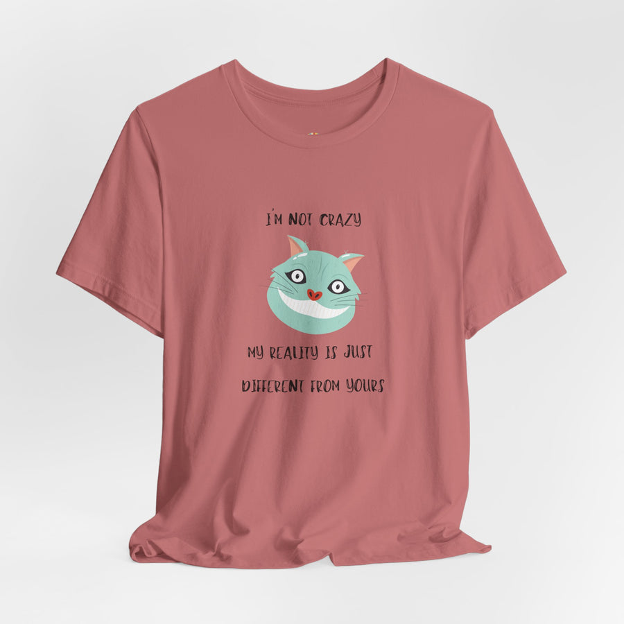 Graphic Tee — “I’m Not Crazy, My Reality Is Just Different From Yours” Wonderland T‑Shirt