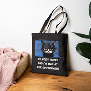 Tote Bag — "My Body Hurts and I’m Mad at the Government" Sassy Cat Canvas Tote