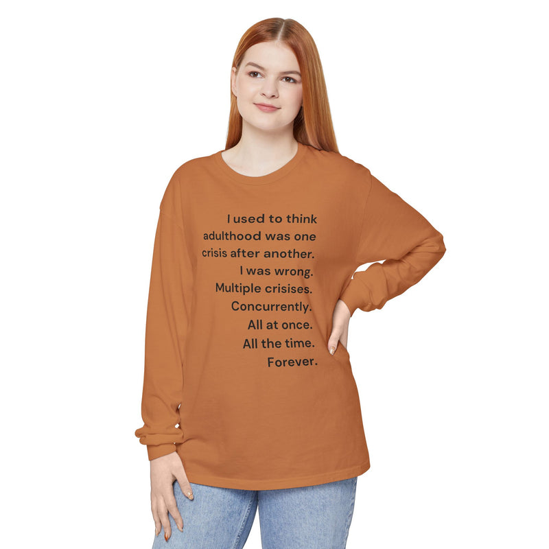 Long Sleeve Tee — “I used to think adulthood was one crisis after another…” Text Graphic