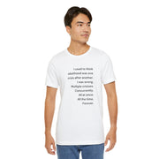 T‑Shirt — 'I used to think adulthood was one crisis after another' Minimal Text Tee