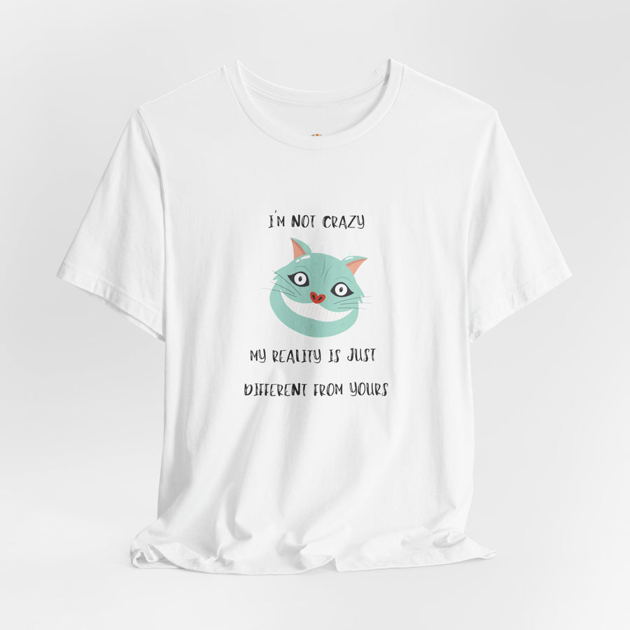 Graphic Tee — “I’m Not Crazy, My Reality Is Just Different From Yours” Wonderland T‑Shirt