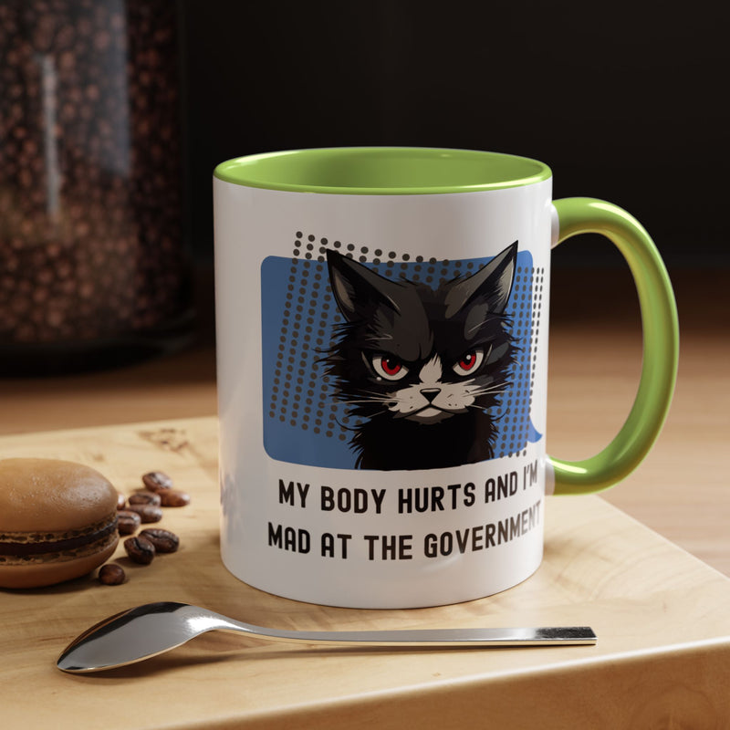 11 oz Coffee and Tea Mug — "My Body Hurts and I'm Mad at the Government" Sassy Cat Accent Mug