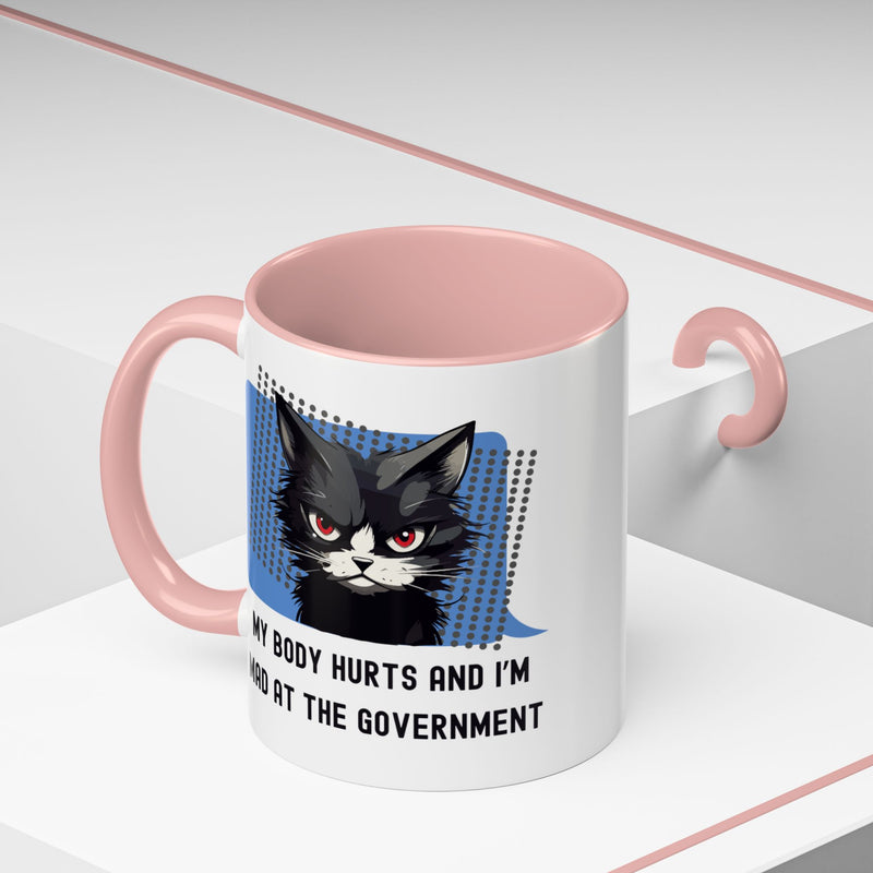 11 oz Coffee and Tea Mug — "My Body Hurts and I'm Mad at the Government" Sassy Cat Accent Mug