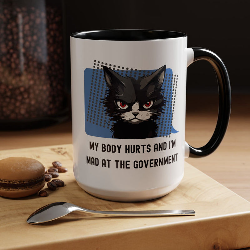Coffee and Tea Mug — "My Body Hurts and I'm Mad at the Government" Sassy Cat Accent Mug