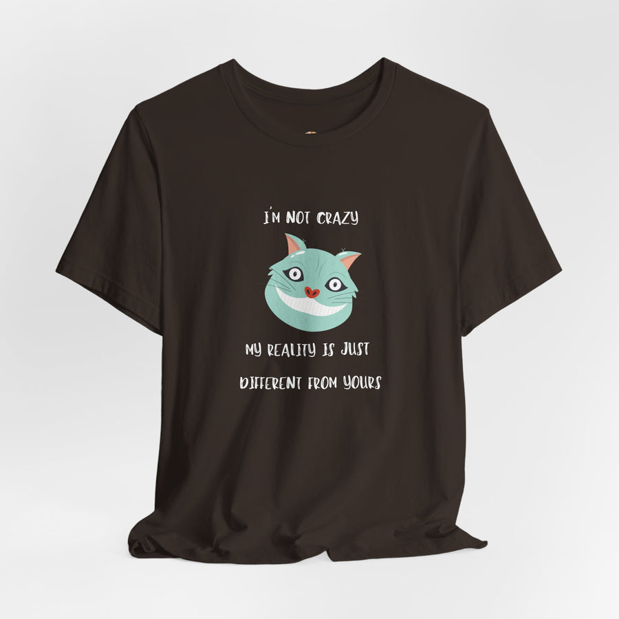 Graphic Tee — “I’m Not Crazy, My Reality Is Just Different From Yours” Wonderland T‑Shirt