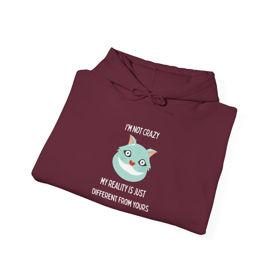 Graphic Hoodie — "I’m Not Crazy, My Reality Is Just Different From Yours" Wonderland Hooded Sweatshirt