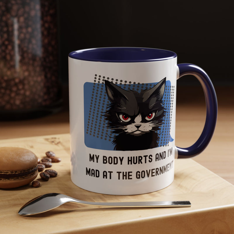 11 oz Coffee and Tea Mug — "My Body Hurts and I'm Mad at the Government" Sassy Cat Accent Mug