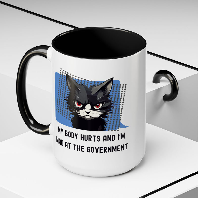 Coffee and Tea Mug — "My Body Hurts and I'm Mad at the Government" Sassy Cat Accent Mug