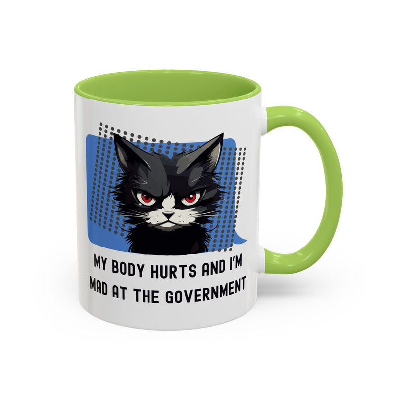 11 oz Coffee and Tea Mug — "My Body Hurts and I'm Mad at the Government" Sassy Cat Accent Mug