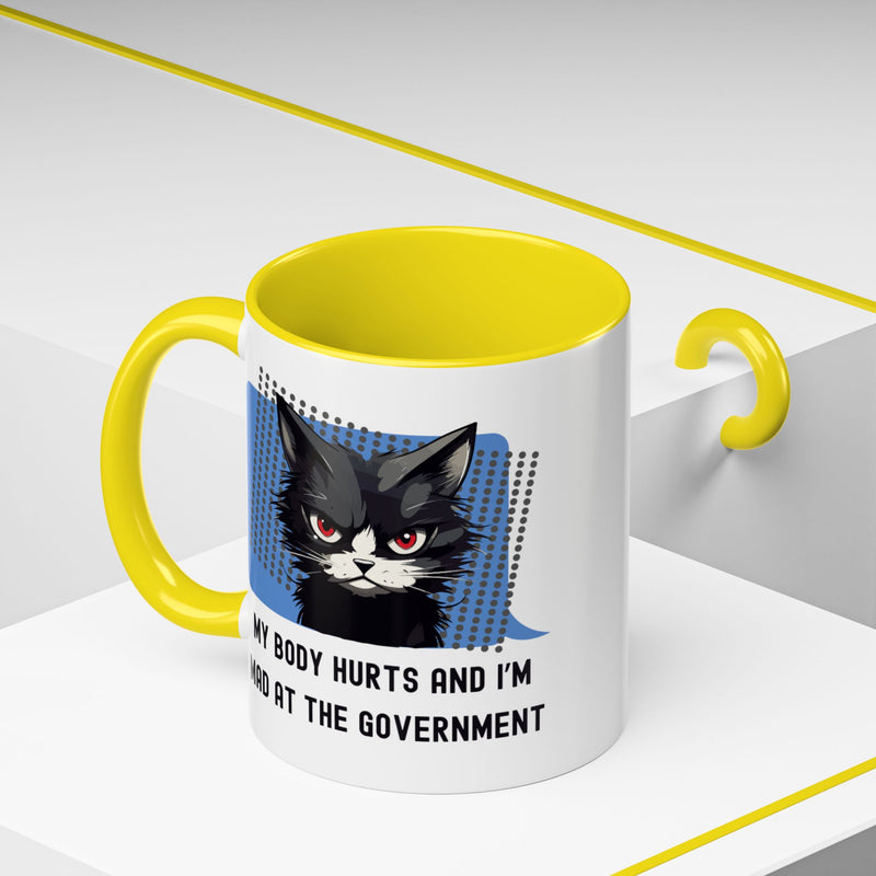 11 oz Coffee and Tea Mug — "My Body Hurts and I'm Mad at the Government" Sassy Cat Accent Mug
