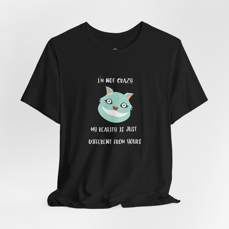 Graphic Tee — “I’m Not Crazy, My Reality Is Just Different From Yours” Wonderland T‑Shirt