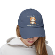 Ironically Inked blue distressed cotton twill cap featuring a grumpy orange kitten graphic and cheeky text.