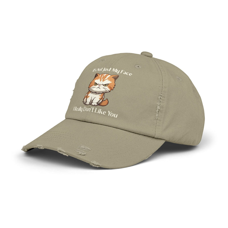 Ironically Inked distressed cotton twill cap in beige featuring a grumpy orange kitten and funny text graphic.