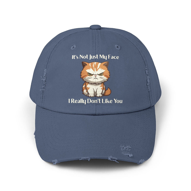 Ironically Inked blue distressed cotton twill cap featuring a grumpy orange kitten graphic and funny text.