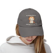 Ironically Inked grey distressed cotton cap featuring a grumpy orange cat graphic and funny text on a person.
