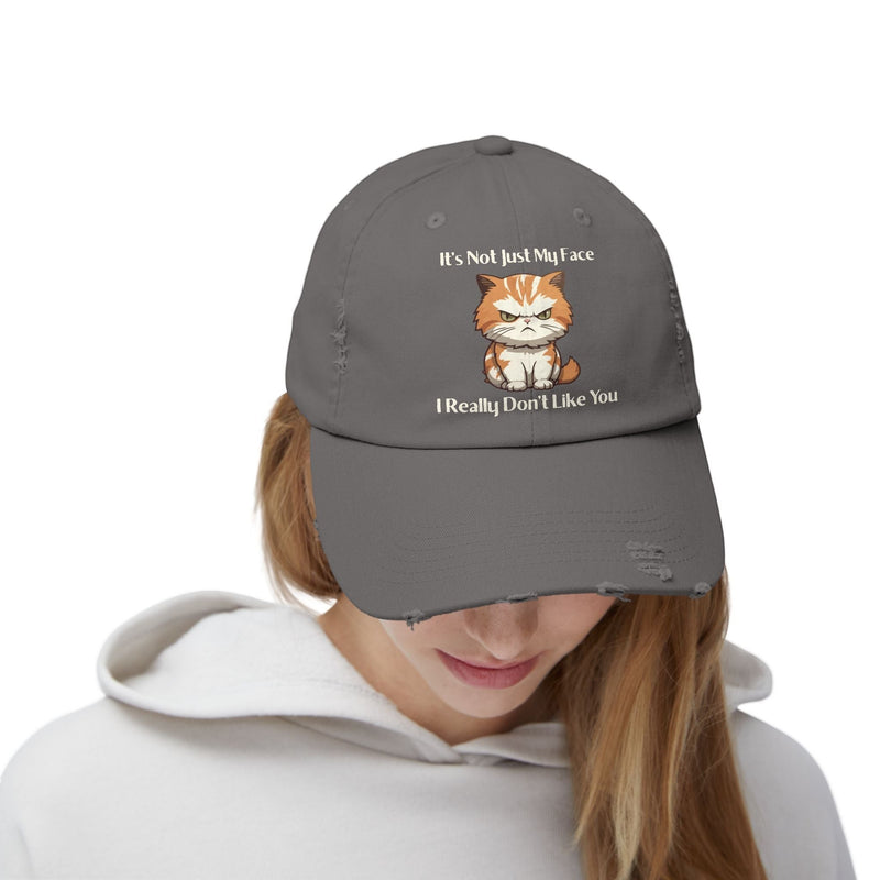Ironically Inked grey distressed cotton cap featuring a grumpy orange cat graphic and funny text on a person.