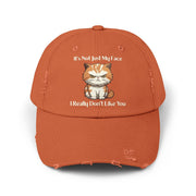 Ironically Inked orange distressed cotton twill cap featuring a grumpy kitten graphic and cheeky text on the front.