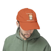 Ironically Inked orange distressed cotton cap featuring a grumpy kitten graphic and cheeky text on a model