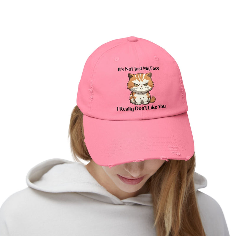 Ironically Inked pink distressed cotton cap featuring a grumpy orange kitten graphic and cheeky text on a woman