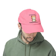 Ironically Inked pink distressed cotton twill cap featuring a grumpy orange kitten graphic and cheeky text.